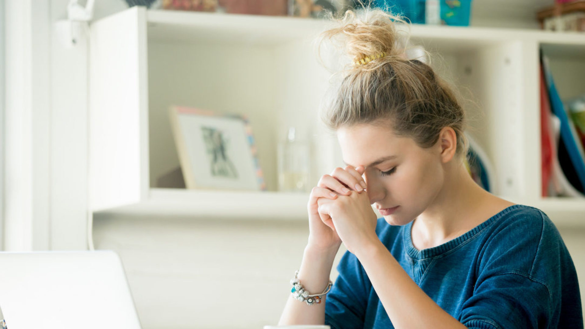 Woman deep in prayer