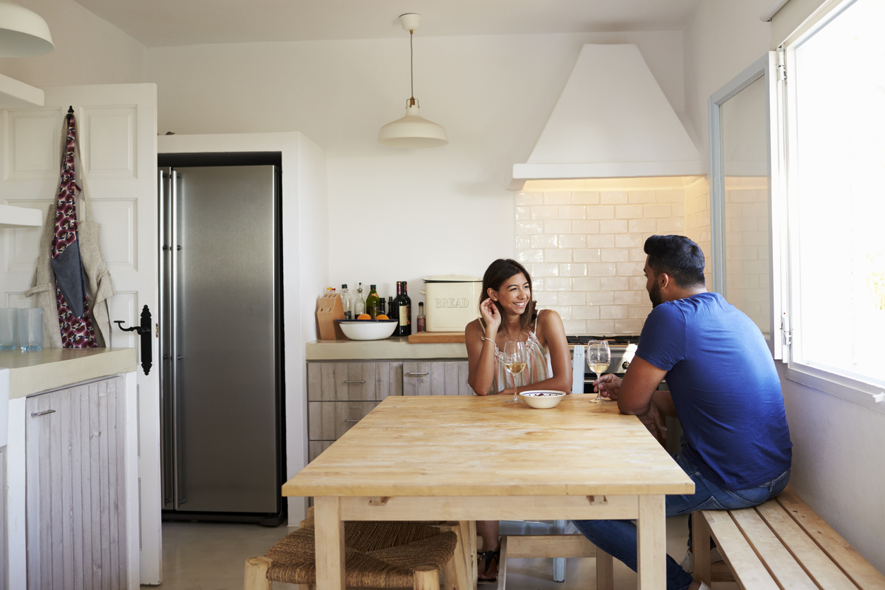 couple with effective communication having a long talk in the kitchen